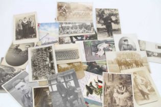 A collection of World war I & II vintage military postcards, including portraits, Regemental, Real