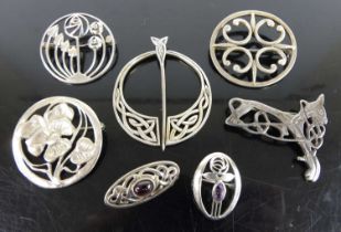 A collection of various silver and white metal brooches, to include Celtic and Art Nouveau style