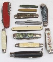 A collection of various folding pocket knives