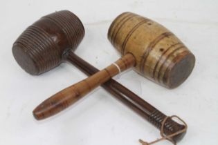 A turned rosewood gavel, length 31cm; together with another