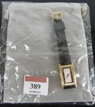 A lady's Gucci quartz tank wristwatch, gilt metal cased, with Gucci suede pouch Not currently