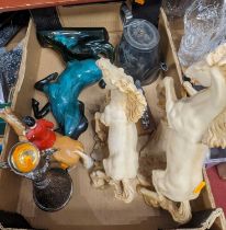 A collection of miscellaneous items, to include resin figures of horses, novelty lighter in the form