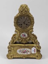 An early 20th century French mantel clock in the Louis XVI style, having a later gilt painted case