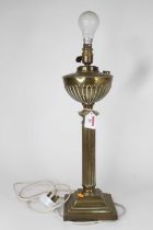 A late 19th century brass oil lamp, converted, h.41cm (excluding fittings)