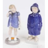 Two Bing & Grondahl figures being of a boy and a girl, largest h.18.5cm The female figure has a mark