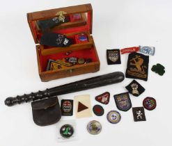 A collection of miscellaneous items to include a British Army Amoured Division cloth formation sign,