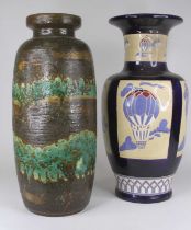 A 20th century West German pottery vase, having a recessed neck and ovoid body with brown and