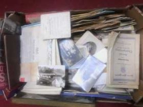 A mixed box of ephemera, to include 1930's sporting programmes, postcards, WW2 pamphlets, Leica