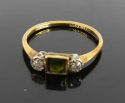 An 18ct gold and platinum, emerald and diamond three-stone ring, 2g, size N Both diamonds probably