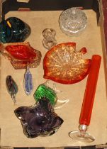 A collection of 20th century coloured glassware, to include Murano style angel fish paperweights