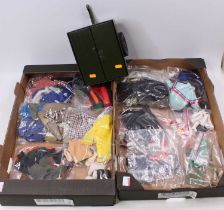 Two trays containing a quantity of Action Man and Sindy military and civilian outfits and