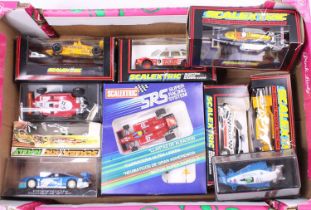 A collection of ten various boxes of Scalextric and Carerra slot racing cars to include a No. C426