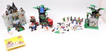 A collection of circa 1980s constructed Lego sets, to include two Robin Hood Hideouts, one