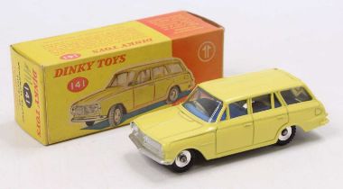 A Dinky Toys No.141 Vauxhall Victor Estate car, comprising yellow body with blue interior and silver