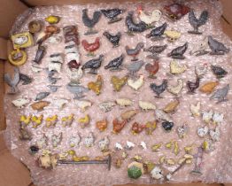 A collection of Britains and other lead hollow cast farm miniatures to include chickens, roosters,