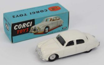 Corgi Toys, 208 Jaguar 2.4 litre, white body with silver detailing, flat spun hubs with glazing,