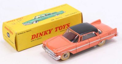 French Dinky Toys, 545 De Soto Diplomat, salmon pink body with black roof, silver flash, concave