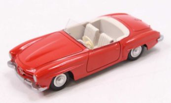 A Marklin No. 8025 Mercedes Benz 190 SL open top saloon comprising red body with off-white