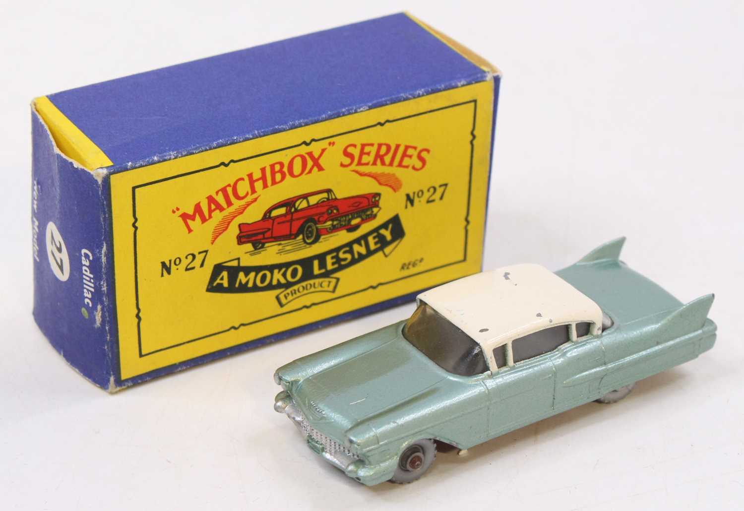 A Matchbox Lesney No. 27 Cadillac 60 Special comprising metallic green body with cream roof,
