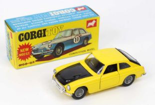 Corgi Toys No. 345 MGC GT competition model comprising of yellow and black body with wire work hubs,