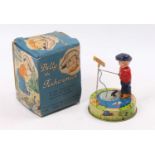 A Mettoy Playthings Billy the Fisherman tin plate and clockwork novelty toy housed in the original