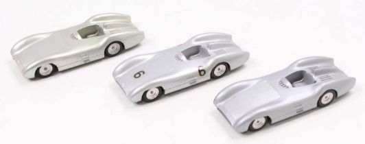 A Marklin No. 8010 Mercedes W196 group of three, comprising of two with silver body and one with