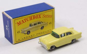 A Matchbox No. 45 Vauxhall Victor comprising yellow body with silver plastic wheels, housed in the