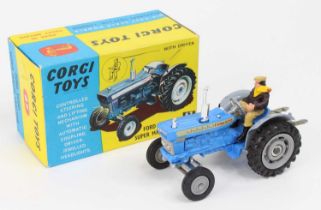 Corgi Toys No. 67 Ford 5000 Super major tractor finished in blue with grey hubs and driver figure,