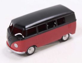 A Marklin No. 5524 Volkswagen Kombi, comprising red lower and black upper body with spun hubs, loose