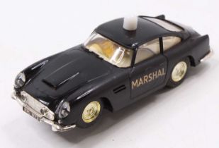 A Scalextric 1/32 scale No. C68 Aston Martin DB4 GT Marshal car, comprising black body with white