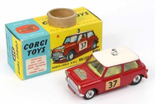 Corgi Toys No.317 B.M.C Mini Cooper with red body and white roof, fitted with yellow interior, jewel