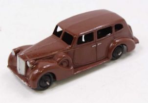 A Dinky Toys loose model of a 39A Packhard saloon in dark brown body with black hubs (NM)