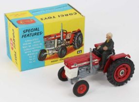 Corgi Toys No. 66 Massey Ferguson 165 tractor comprising of red and grey body with red hubs,