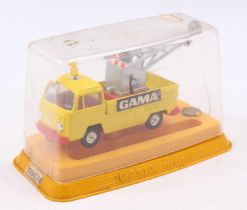 A Gama No. 09574 Volkswagen breakdown truck comprising of yellow body with red bumper and matching