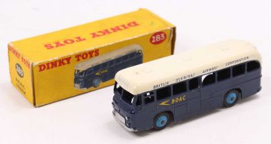Dinky Toys No. 283 BOAC coach comprising dark blue & white body with light blue hubs, in the