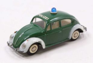 Tekno 819 Volkswagen Saloon Beetle, Polizei, comprising green and white body with white interior,