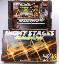 A Scalextric Night Stages slot racing set housed in the original polystyrene packed box with a