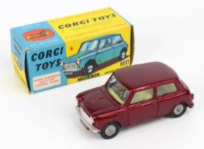 Corgi Toys No. 226 Morris Mini Minor comprising of metallic maroon body with lemon interior, and