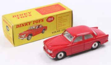 Dinky Toys No. 184 Volvo 122S comprising of red body with cream interior and spun hubs, housed in