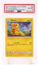 A PSA Graded 2017 Pokemon Sun and Moon Let's Play, Pikachu! Theme Deck "Pikachu" card in cracked ice