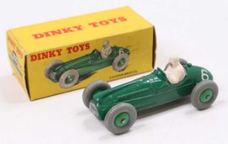 A Dinky Toys No. 233 Cooper Bristol racing car, having green body, white driver figure and green