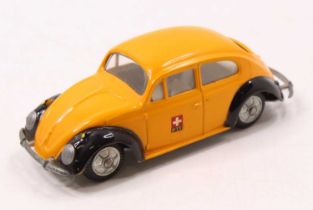 Tekno 819 Volkswagen Saloon Beetle PTT comprising yellow and black body with white interior and cast