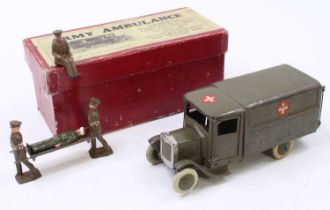 A Britains No. 1512 pre-war military ambulance comprising of mid green body with white rubber tyres,