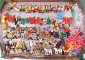 A large tray of various toy figures dating from the 1960s to the 1980s to include various Disney