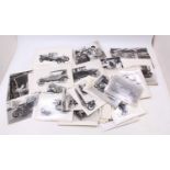 One tray containing a quantity of various black & white photos used in the production stage at