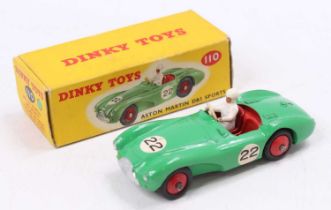Dinky Toys No. 110 Aston Martin DB3 sports car comprising green body, red hubs and red interior with