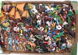 A collection of Britains 1970s vintage Herald and Hong Kong cowboys, Indians, canoes, and teepees,