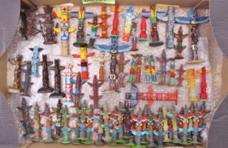 A very large collection of Vintage mainly Plastic American Indian Totem Poles by Many makers