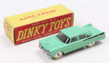 A Dinky Toys No. 191 Dodge Royal Sedan, comprising green body with black rear flash and spun hubs,