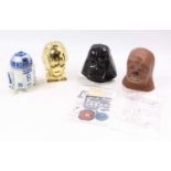 A collection of four various Star Wars Micro Machines gift sets, one of R2D2, Chewbacca, C3PO, and